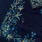 Embroidered border and floral motif detail