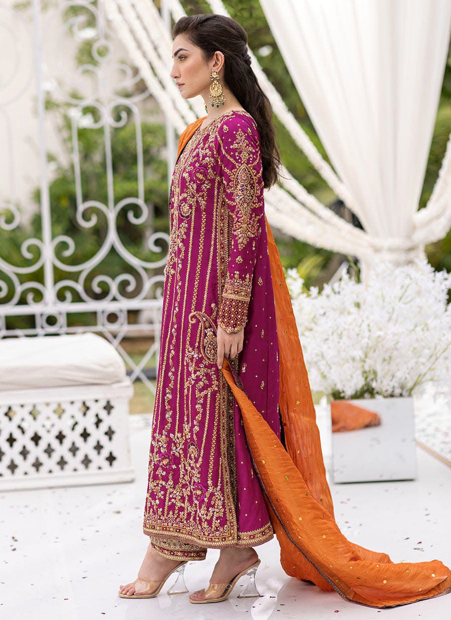Magenta handwork chiffon suit with orange dupatta - model standing side view